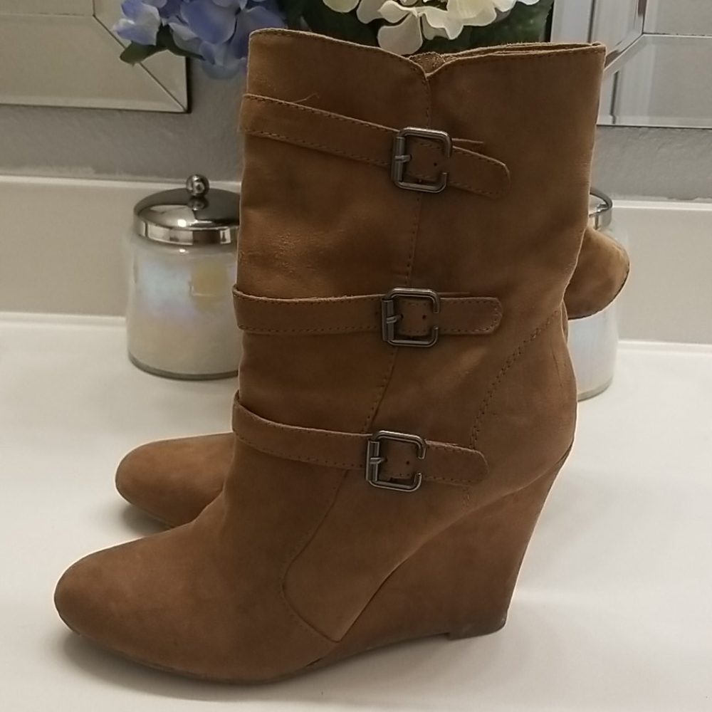 Tan buckle booties